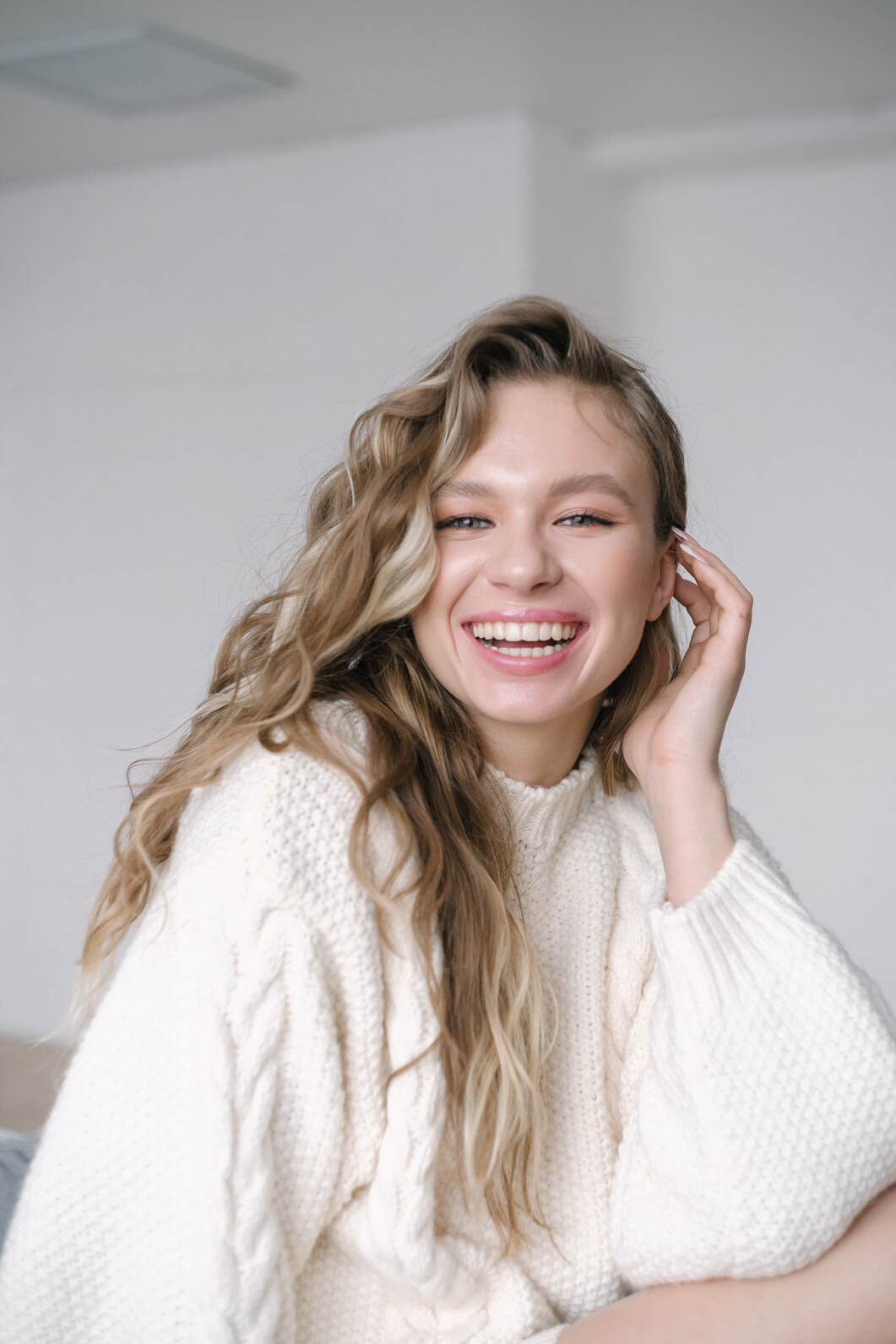 A Happy Woman in a Sweater